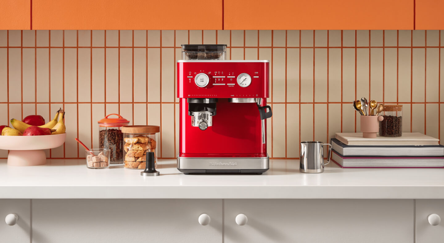 Red KitchenAid® Semi-Automatic Espresso Machine in a bright, modern kitchen  Red KitchenAid® Semi-Automatic Espresso Machine in a bright, modern kitchen