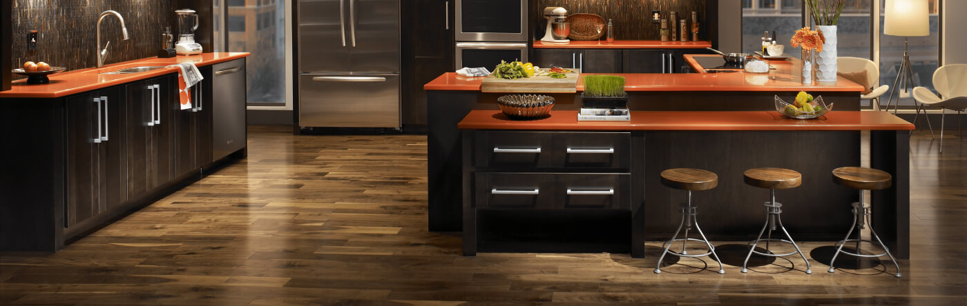 Open concept kitchen with kitchen island and counter stools