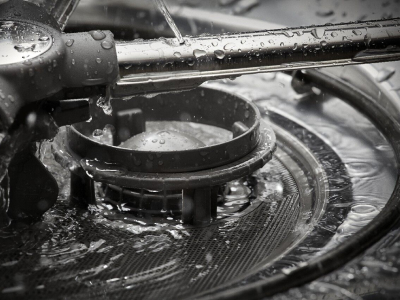 Close up image of the bottom of a dishwasher