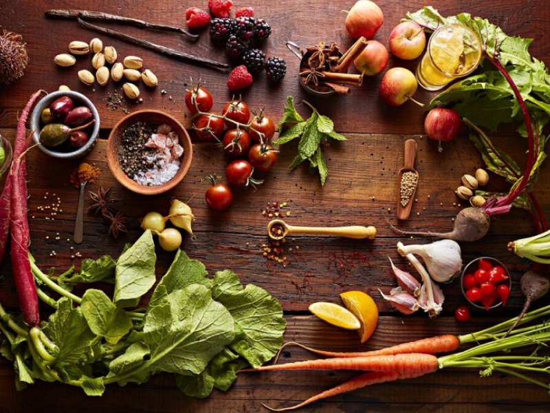 Various vegetables, fruits, herbs and spices on wooden table Various vegetables, fruits, herbs and spices on wooden table