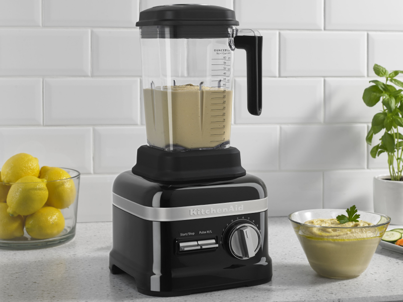 A KitchenAid® blender blending homemade hummus A KitchenAid® blender blending homemade hummus