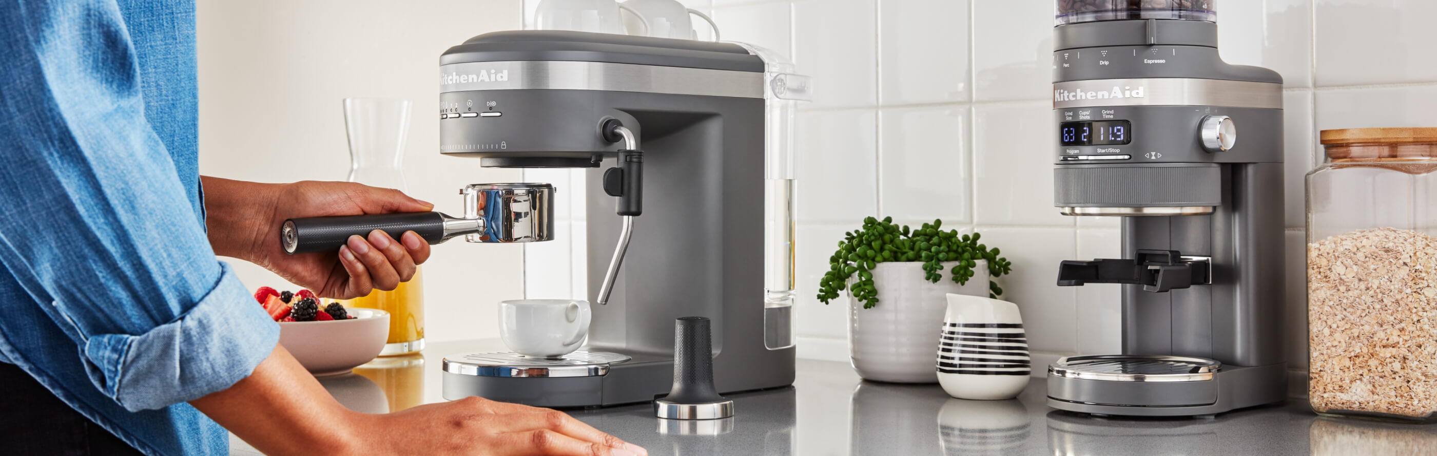 Person placing a portafilter on a semi-automatic espresso machine