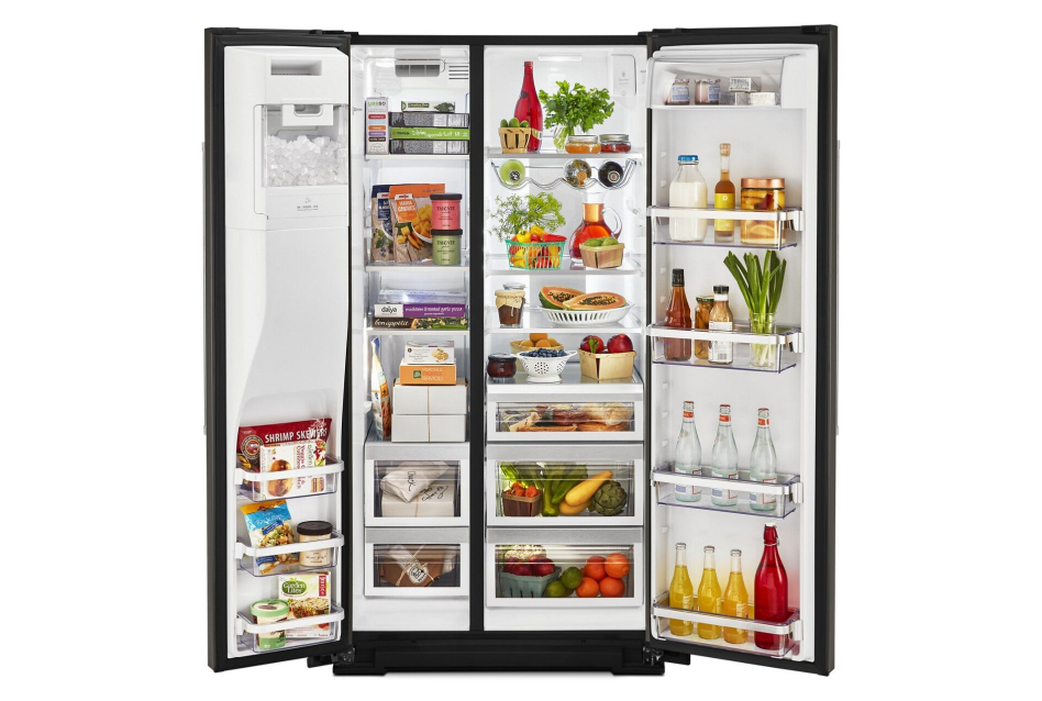 Side by side refrigerator open with food inside Side by side refrigerator open with food inside