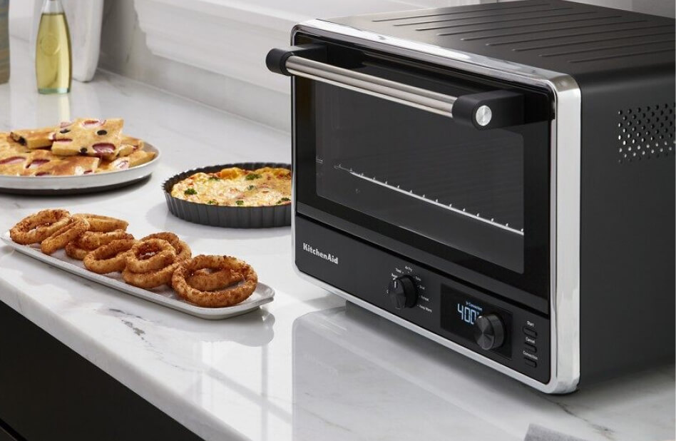KitchenAid® countertop oven with various foods KitchenAid® countertop oven with various foods