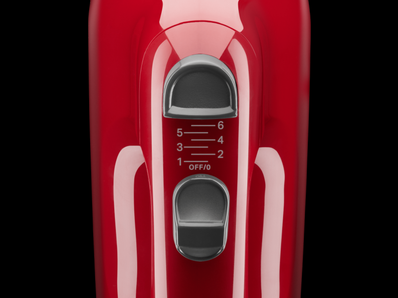 Close up of speed settings on red KitchenAid® hand mixer