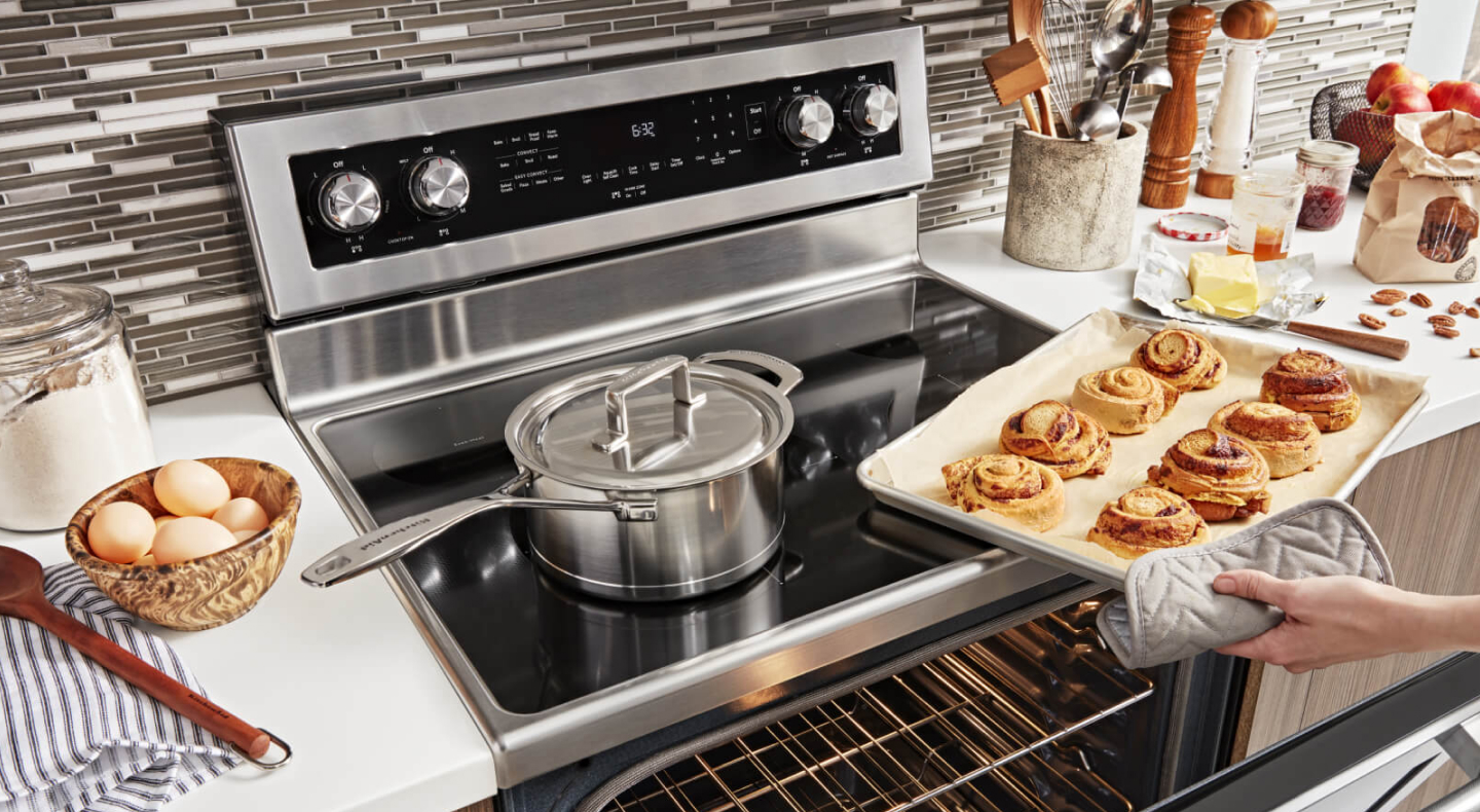 A sheet of cinnamon buns fresh from the oven A sheet of cinnamon buns fresh from the oven