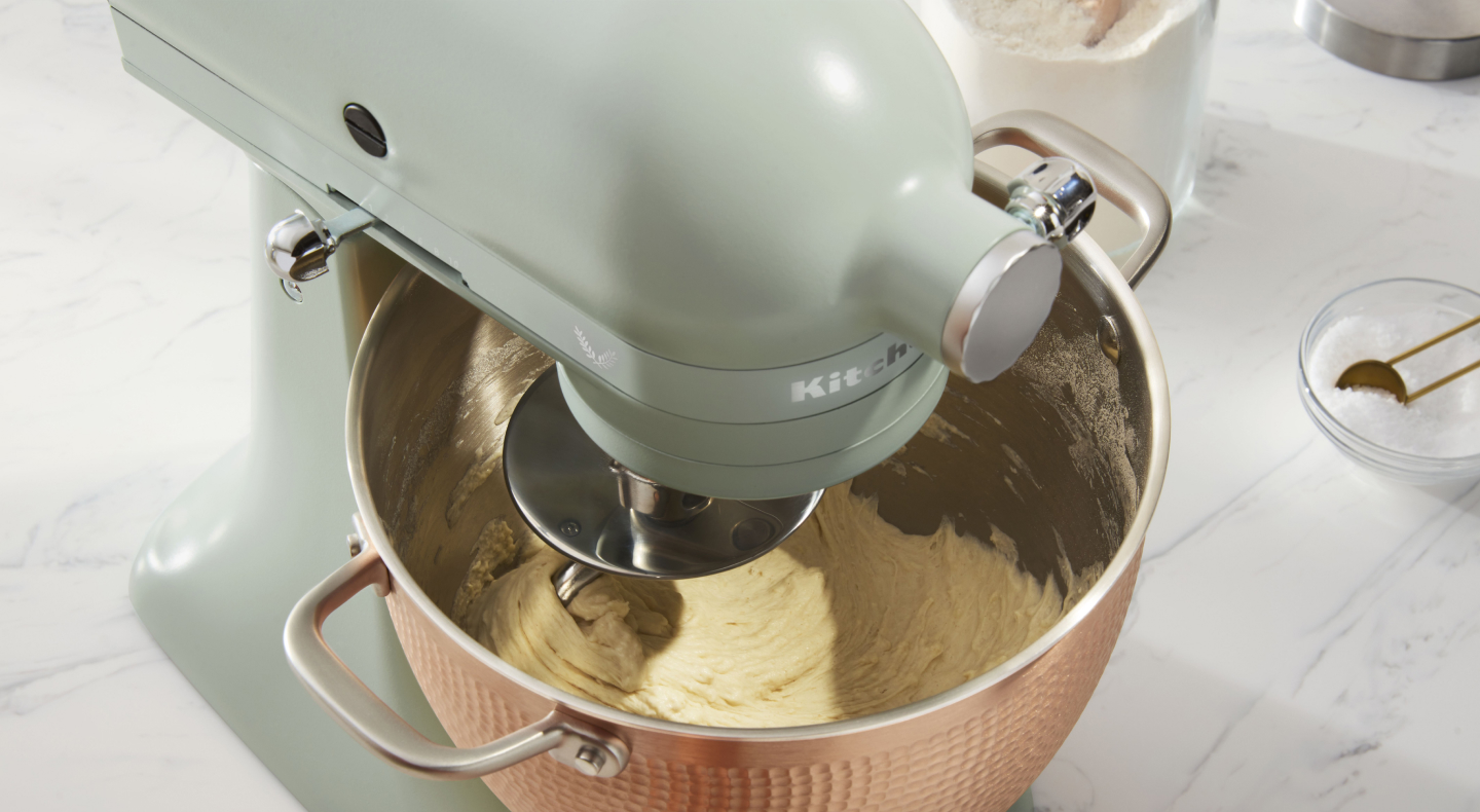 Batter being mixed inside a KitchenAid® stand mixer. Batter being mixed inside a KitchenAid® stand mixer.