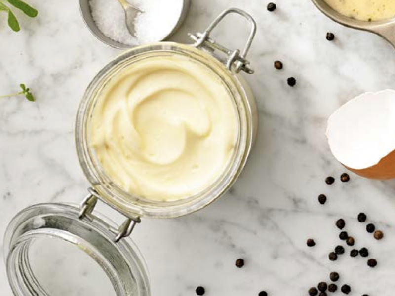 An open jar of mayo An open jar of mayo
