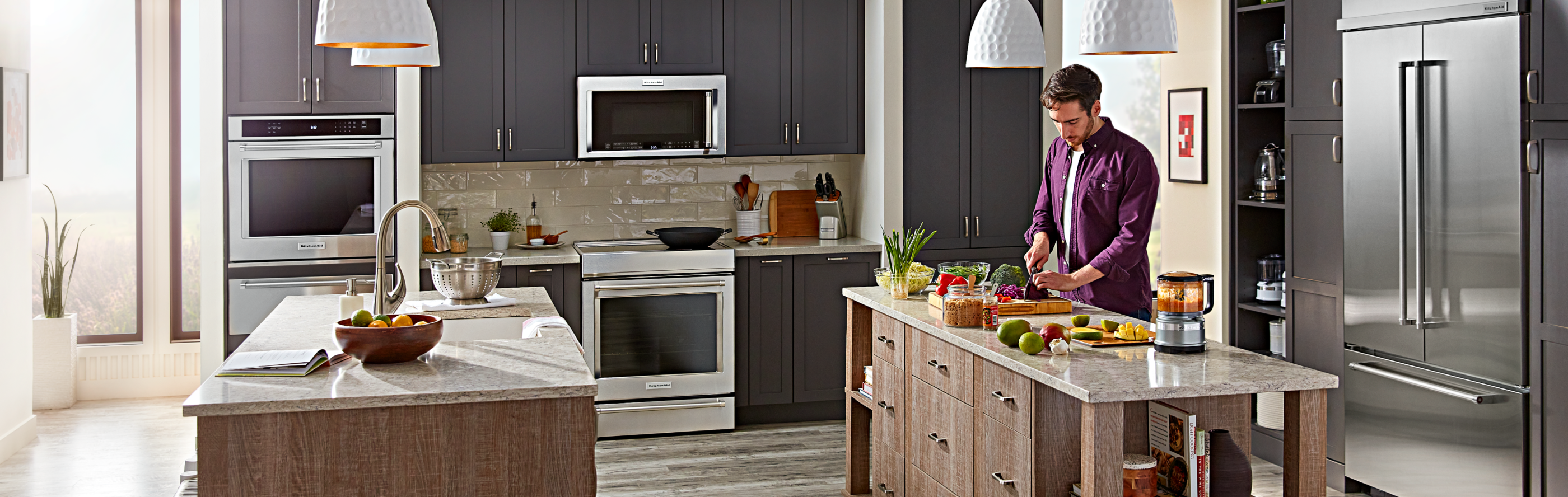 KitchenAid® stainless steel appliances in a modern kitchen