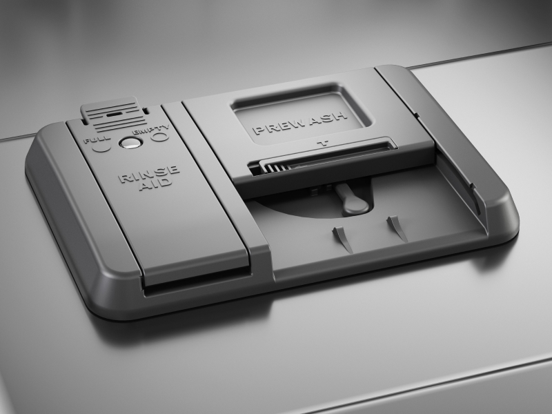 The detergent dispenser of a KitchenAid® dishwasher.