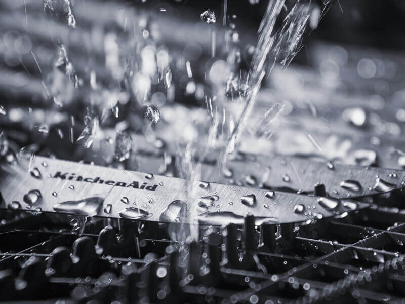Clean water spraying knives inside of a dishwasher Clean water spraying knives inside of a dishwasher