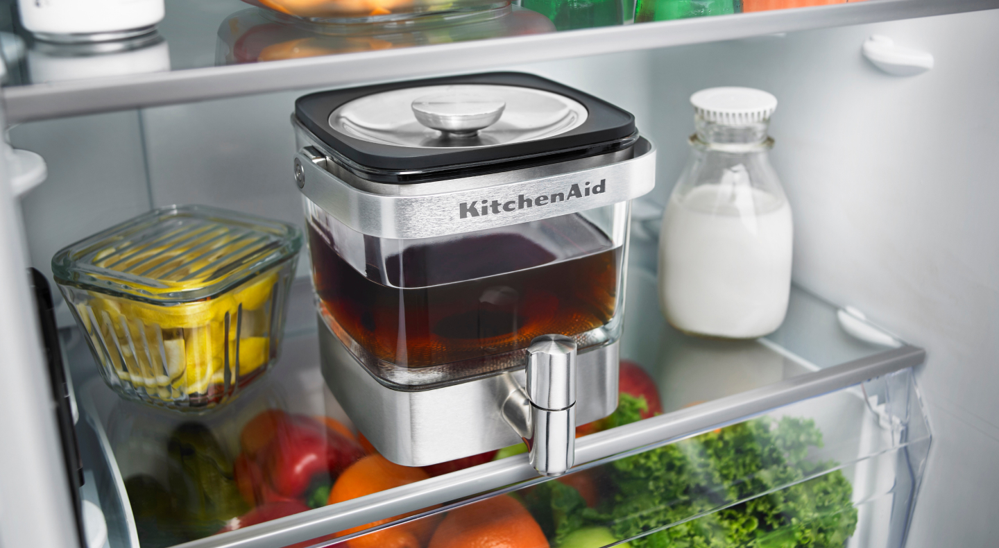 KitchenAid® cold brew maker filled with tea in a refrigerator  KitchenAid® cold brew maker filled with tea in a refrigerator