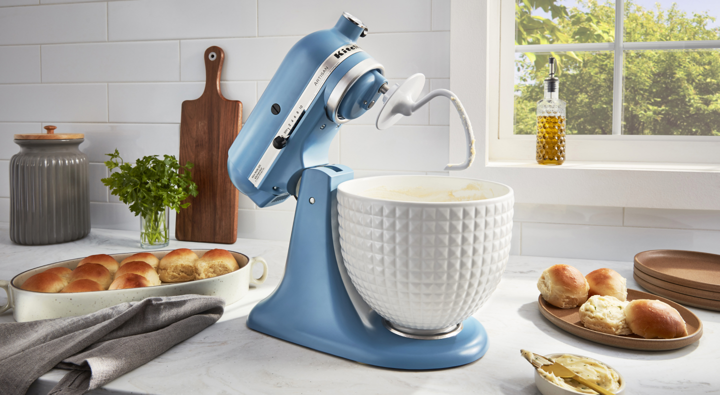 A blue KitchenAid® stand mixer used to make rolls A blue KitchenAid® stand mixer used to make rolls