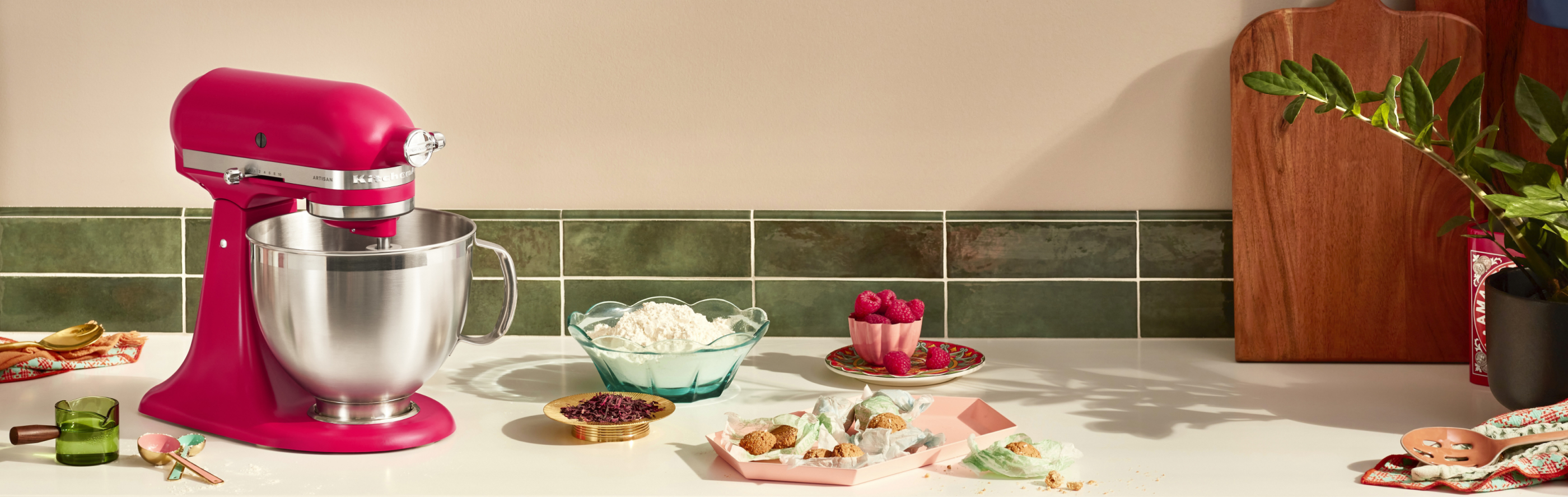 A red KitchenAid® stand mixer used to make desserts