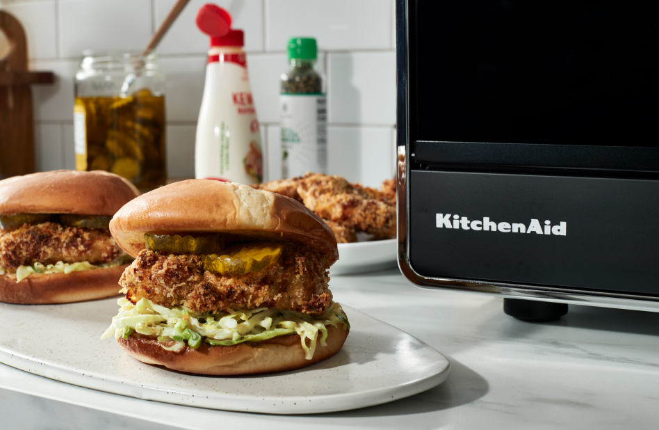 Air fryer chicken katsu sandwiches next to KitchenAid® countertop oven Air fryer chicken katsu sandwiches next to KitchenAid® countertop oven