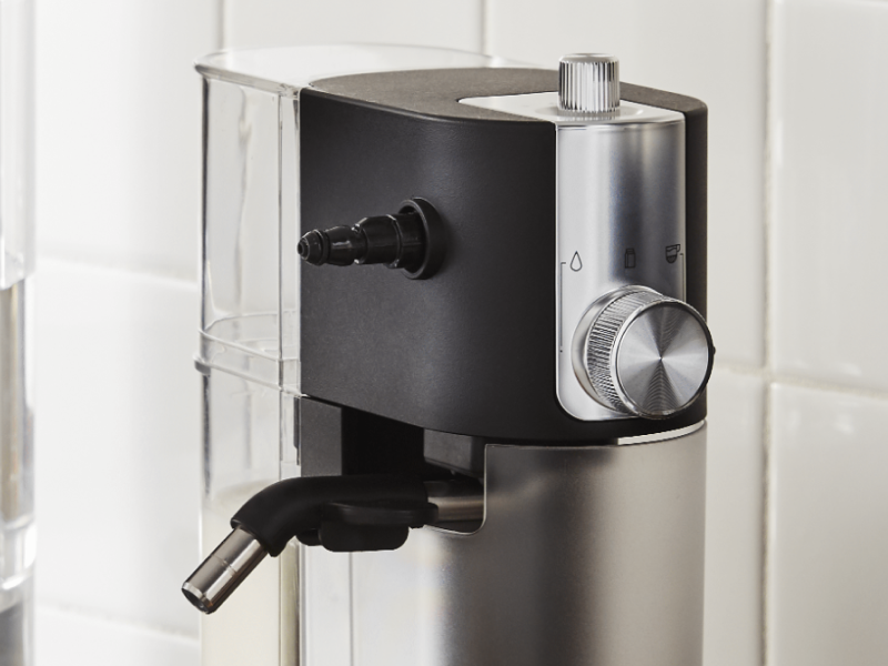 Close-up of black and silver milk frother