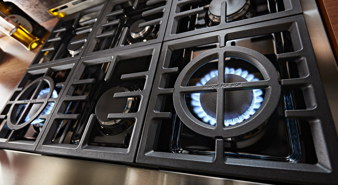 A gas stovetop with two activated burners A gas stovetop with two activated burners
