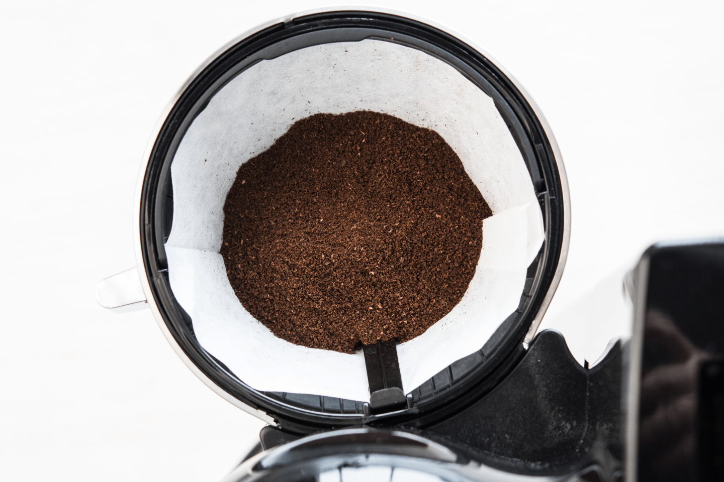 Fresh coffee beans in a coffee filter Fresh coffee beans in a coffee filter