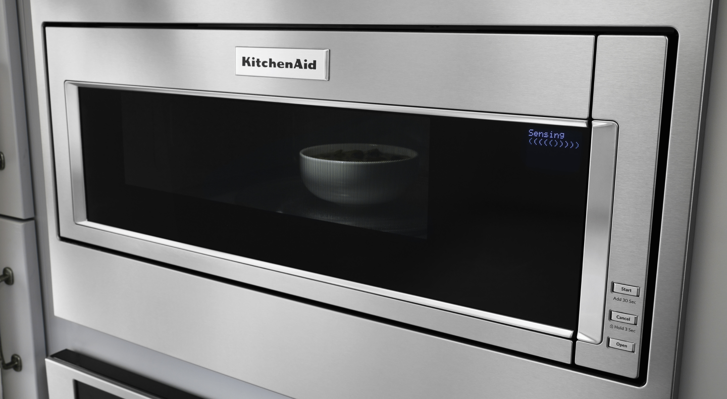 A bowl of food in a stainless steel KitchenAid® built-in microwave with sensor cooking A bowl of food in a stainless steel KitchenAid® built-in microwave with sensor cooking
