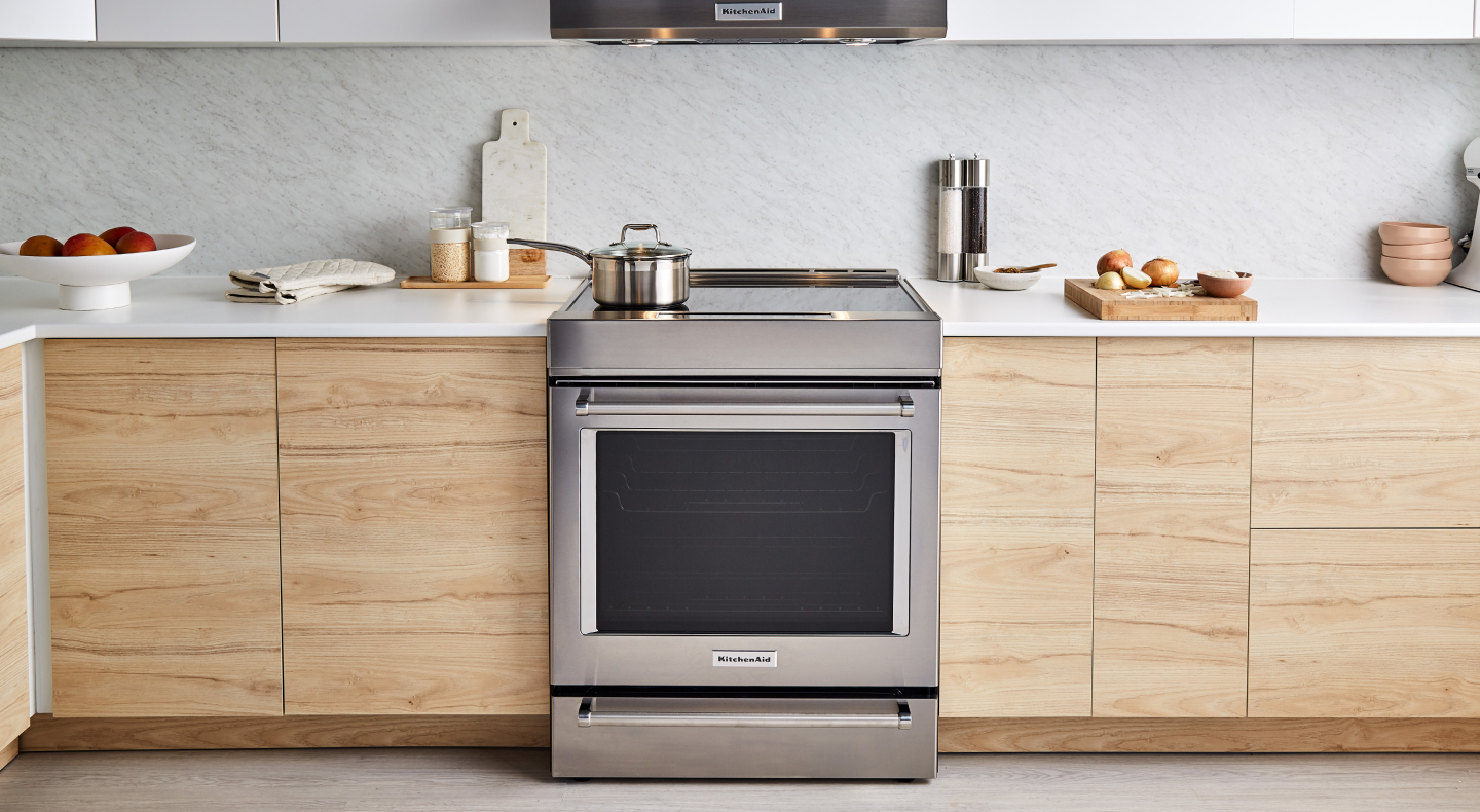 A stainless steel KitchenAid® slide-in range in a modern kitchen A stainless steel KitchenAid® slide-in range in a modern kitchen