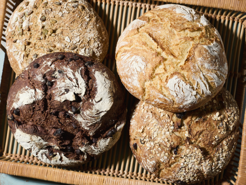 Round loaves of bread in basket Round loaves of bread in basket