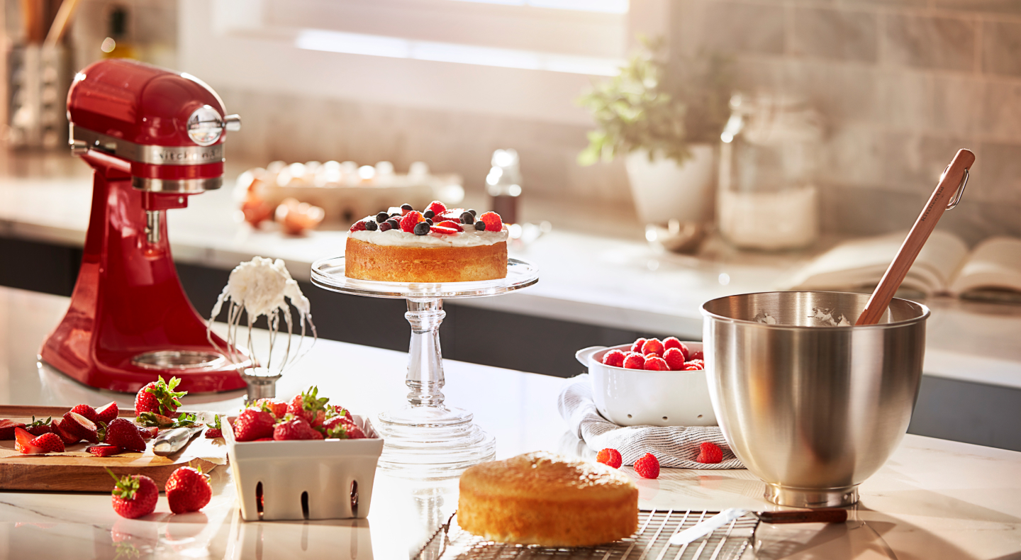 KitchenAid® stand mixer on a countertop with baked goods KitchenAid® stand mixer on a countertop with baked goods