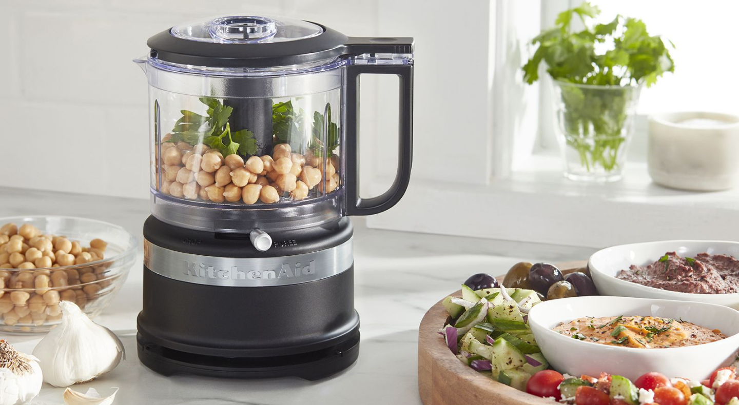 A KitchenAid® food processor full of charcuterie ingredients A KitchenAid® food processor full of charcuterie ingredients