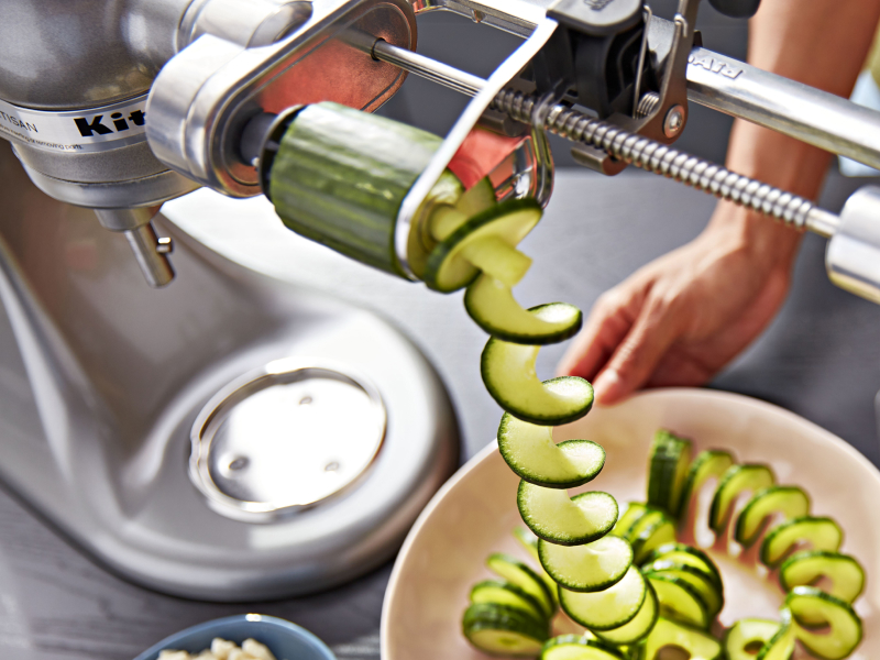 A KitchenAid® spiralizer with a cucumber A KitchenAid® spiralizer with a cucumber