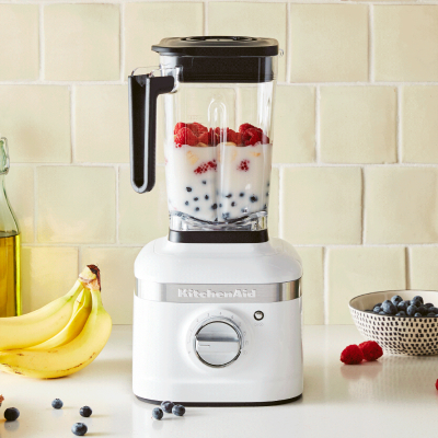 White KitchenAid® blender blending smoothie ingredients