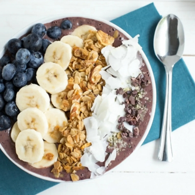 Acai bowl topped with fruit and granola