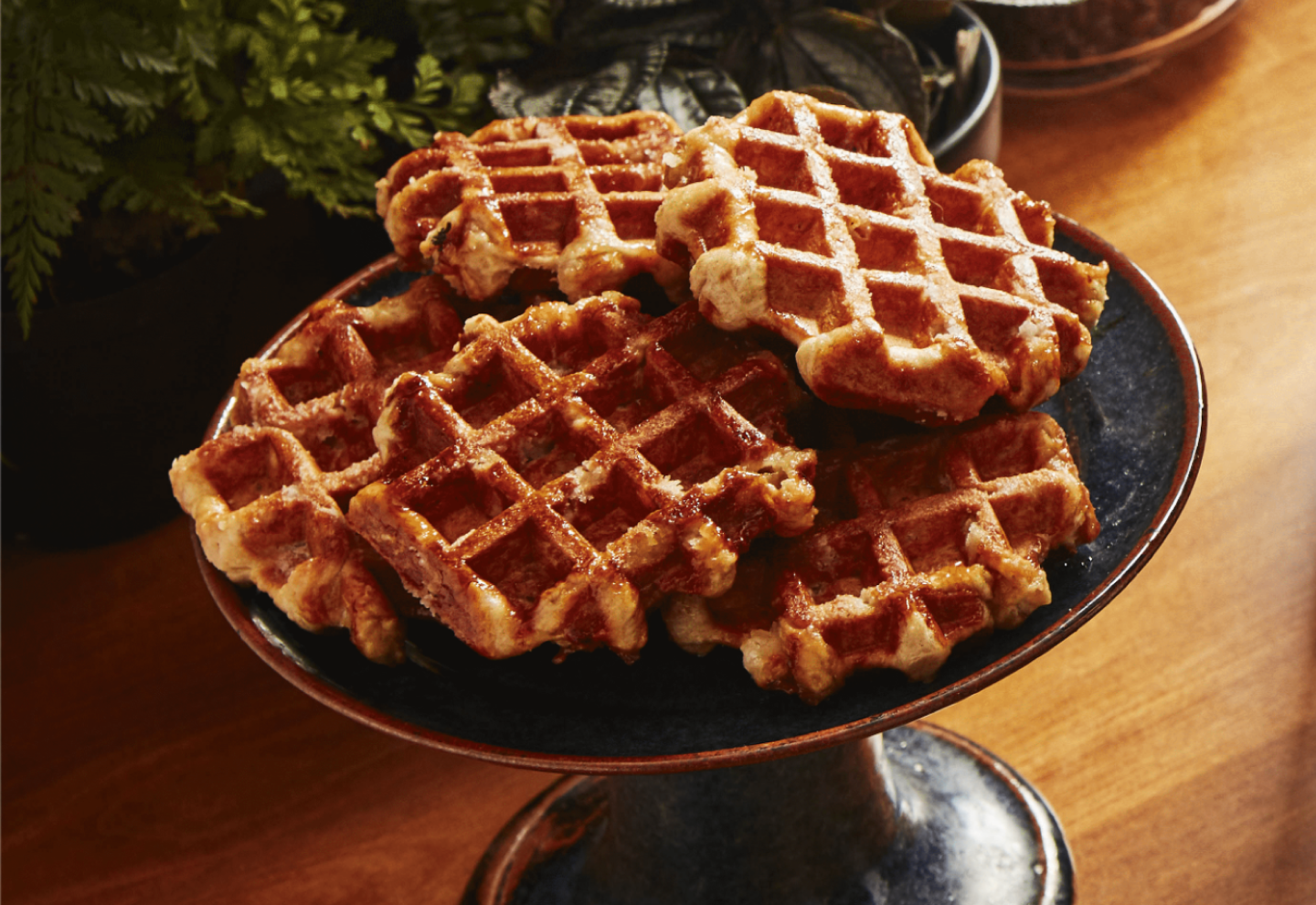 Waffles on a serving platter. Waffles on a serving platter.