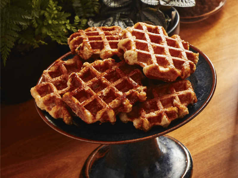 Waffles on a serving platter. Waffles on a serving platter.