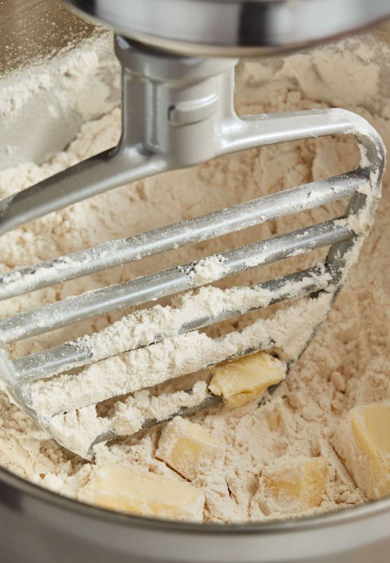 KitchenAid® Pastry Beater cutting butter into flour KitchenAid® Pastry Beater cutting butter into flour