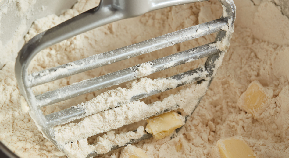 KitchenAid® Pastry Beater cutting butter into flour KitchenAid® Pastry Beater cutting butter into flour