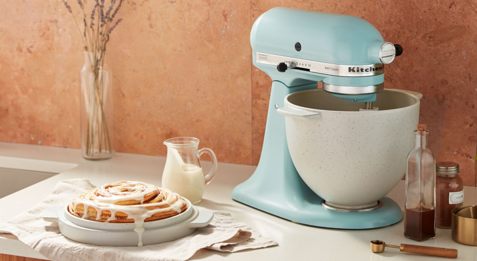 Mineral Water Blue stand mixer on counter with cinnamon roll bread Mineral Water Blue stand mixer on counter with cinnamon roll bread