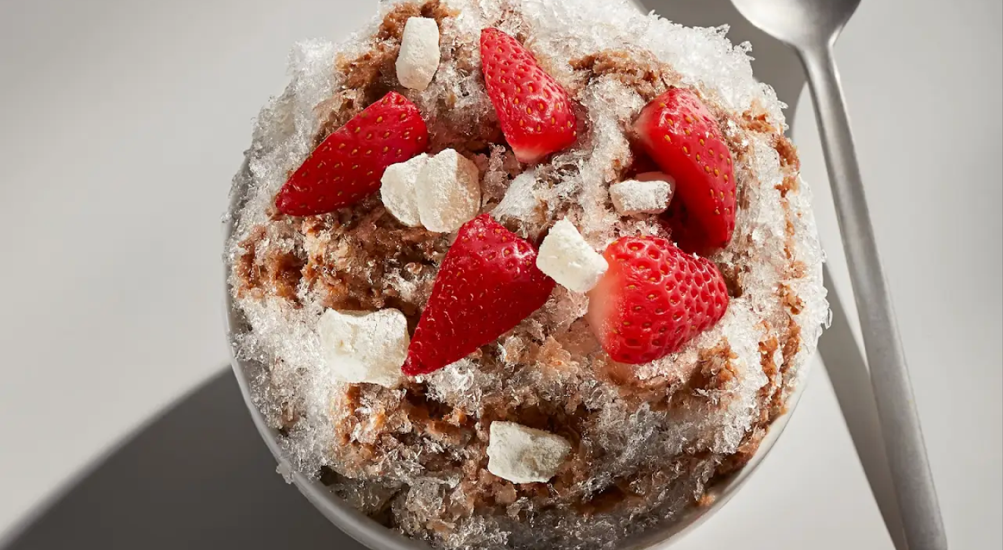 Shaved ice with strawberries on top