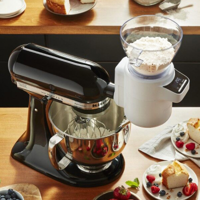 Confectioner’s sugar being sifted