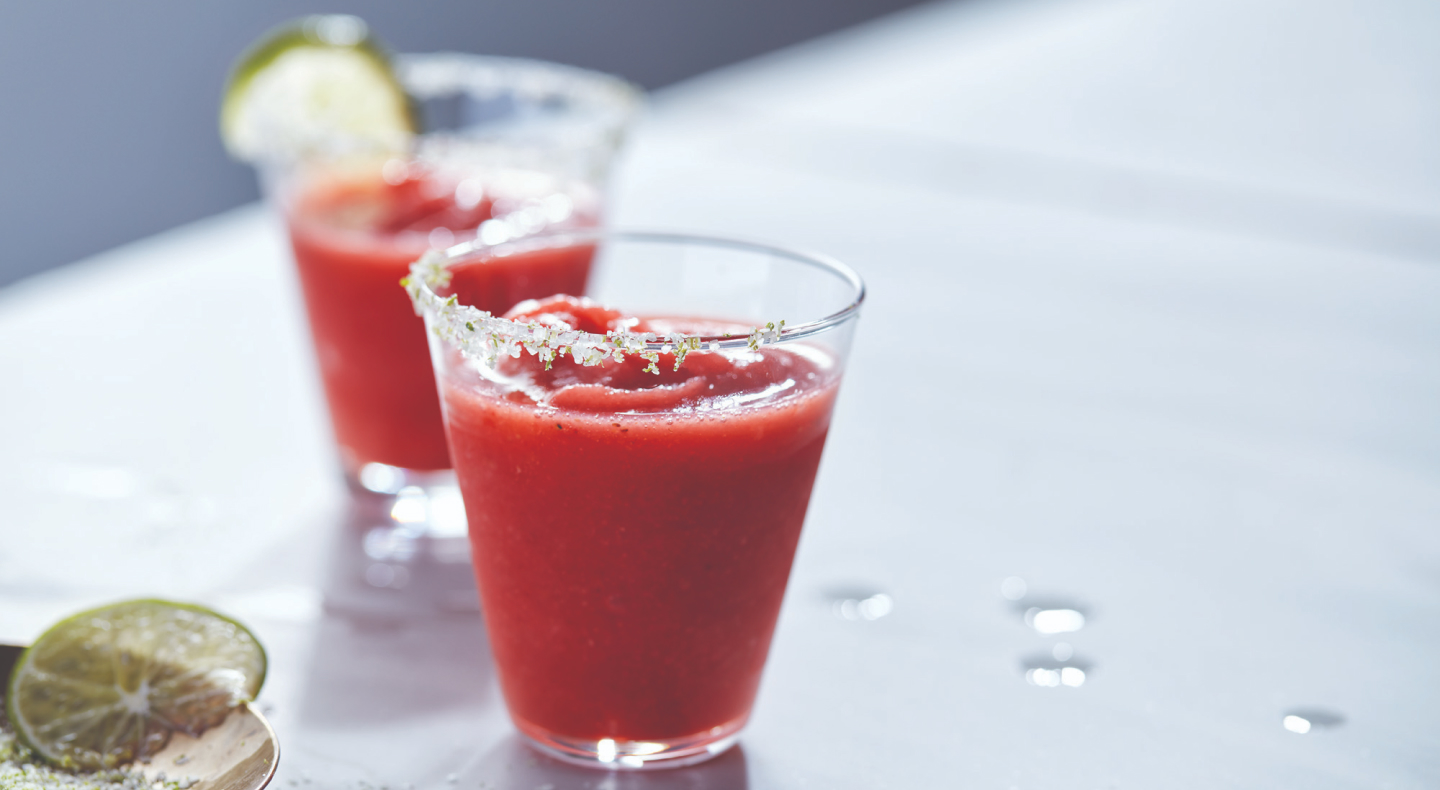 Strawberry margaritas in glasses with sugared rim Strawberry margaritas in glasses with sugared rim