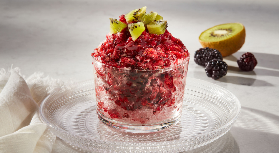 Blackberry Hawaiian shave ice topped with kiwi Blackberry Hawaiian shave ice topped with kiwi