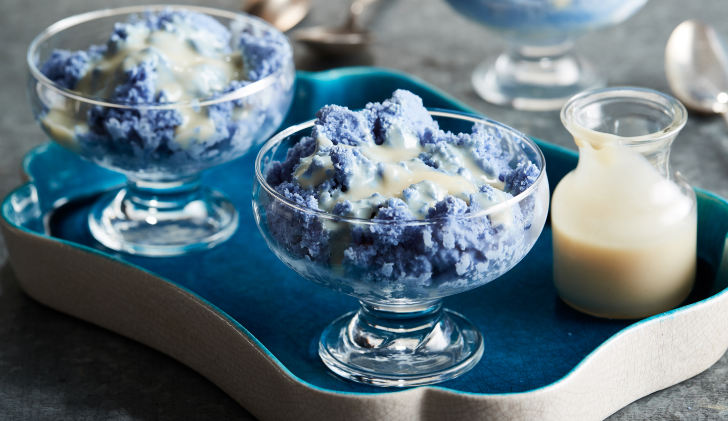 Blue granita topped with sweetened condensed milk  Blue granita topped with sweetened condensed milk