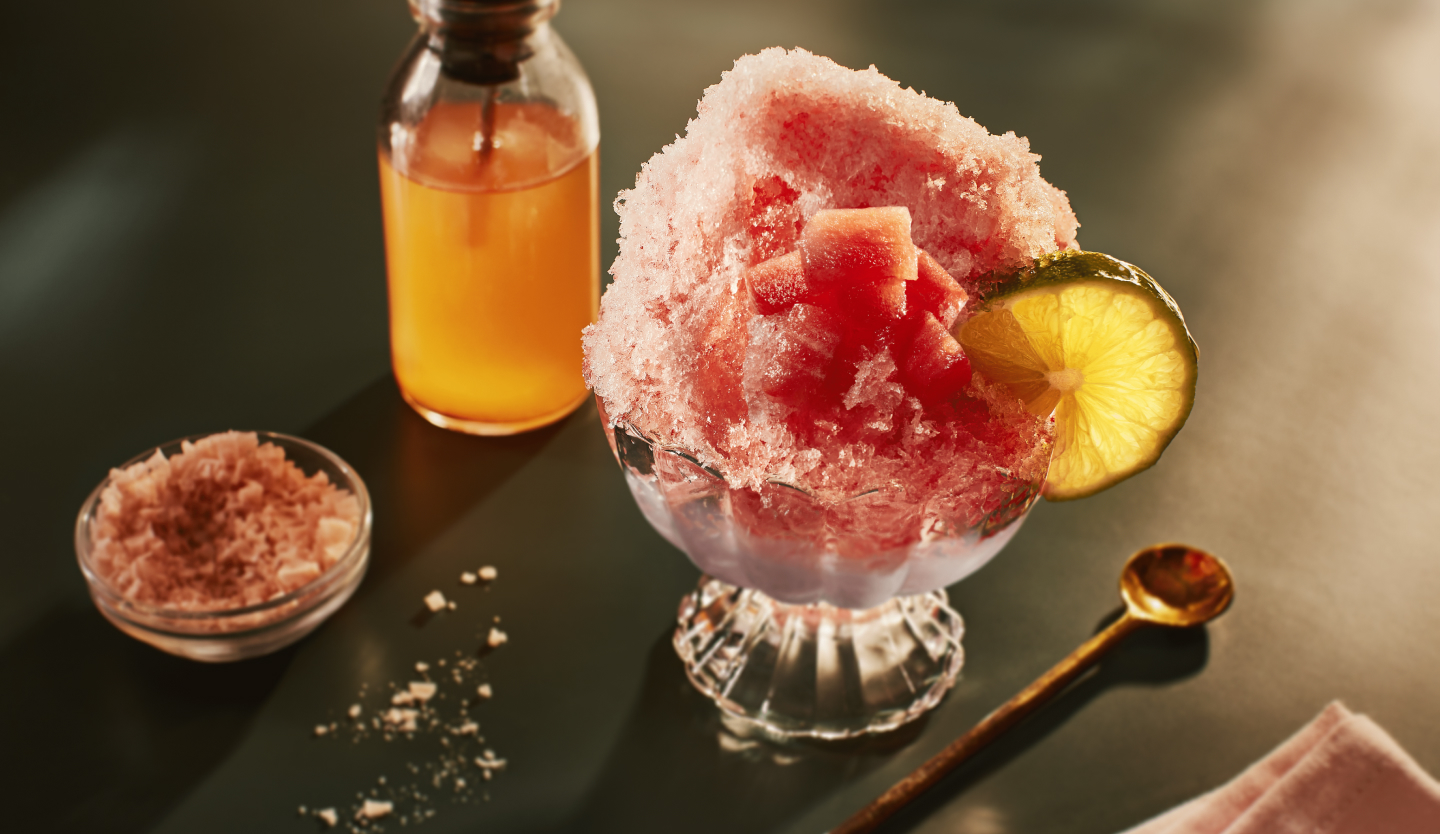 Watermelon Italian ice garnished with a lime Watermelon Italian ice garnished with a lime