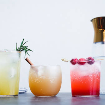 Three different fruit juices in a row