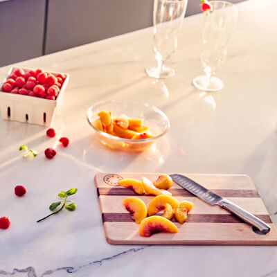 Peach slices on a cutting board