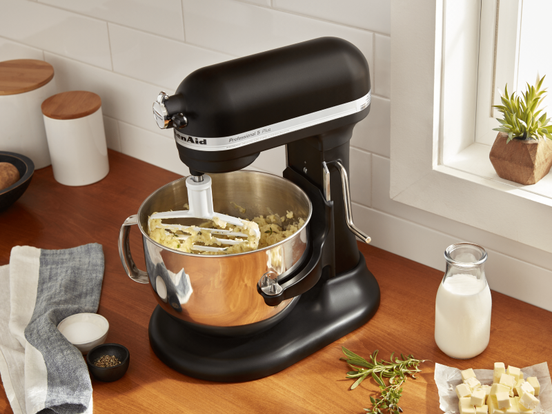 Mashed potatoes in a bowl-lift black stand mixer Mashed potatoes in a bowl-lift black stand mixer