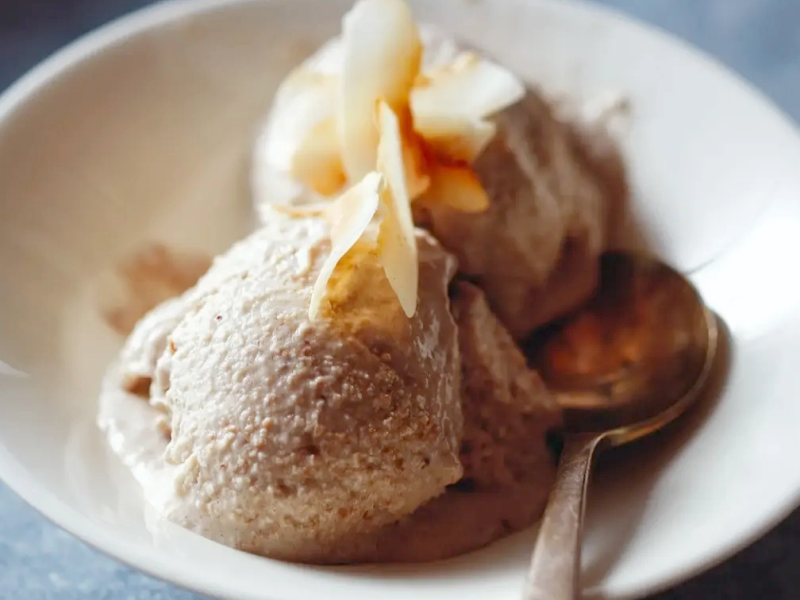 A dish of toasted coconut nice cream A dish of toasted coconut nice cream