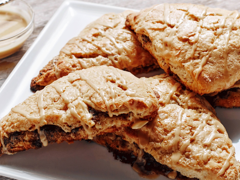 Homemade scones drizzled with glaze Homemade scones drizzled with glaze