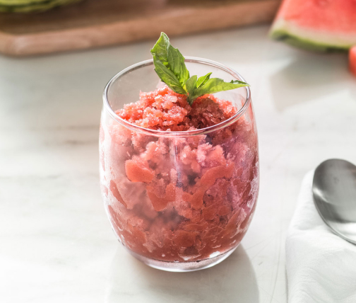 Strawberry granita garnished with basil
