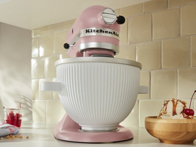 Pink KitchenAid® stand mixer next to ice cream sundae Pink KitchenAid® stand mixer next to ice cream sundae