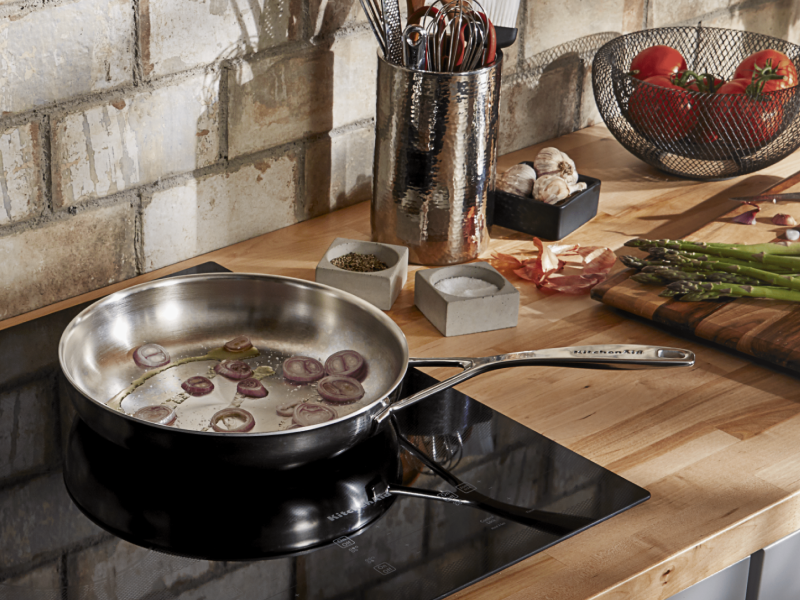 A pan with sautéed onions.