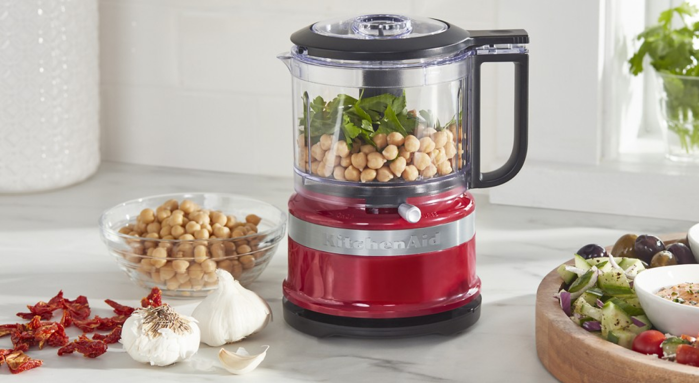 KitchenAid® food processor with chickpeas, fresh herbs, sundried tomatoes and garlic. KitchenAid® food processor with chickpeas, fresh herbs, sundried tomatoes and garlic.
